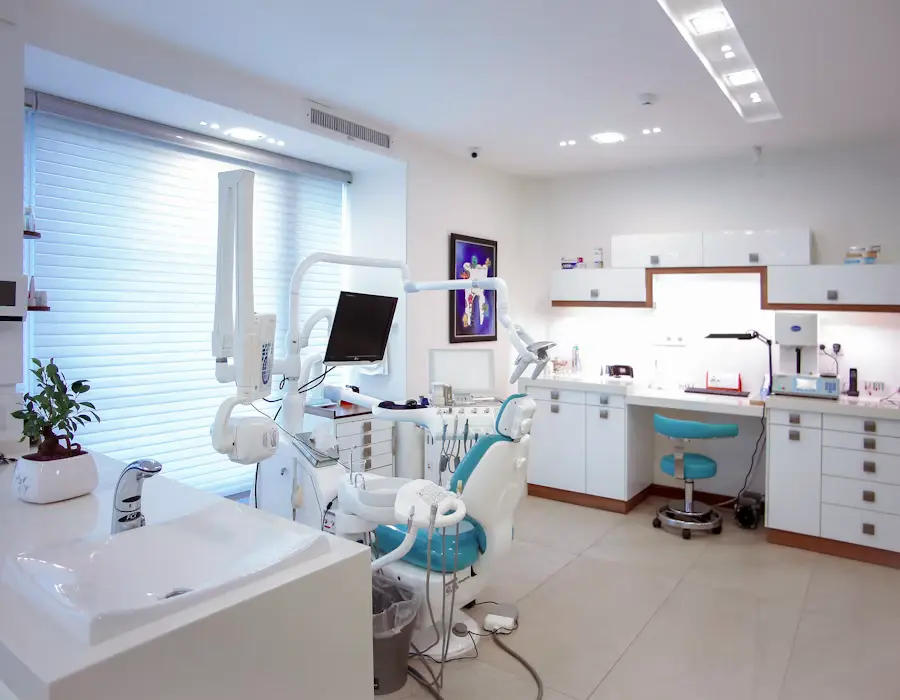 Treatment room at Asbita Orthodontics with orthodontic chair, monitor, and digital imaging equipment
